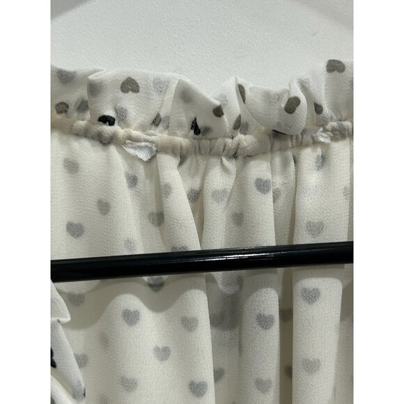 Heart-Printed Ivory Sleeveless Blouse With Ruffled Detail V-Neckline - Picture 5 of 9